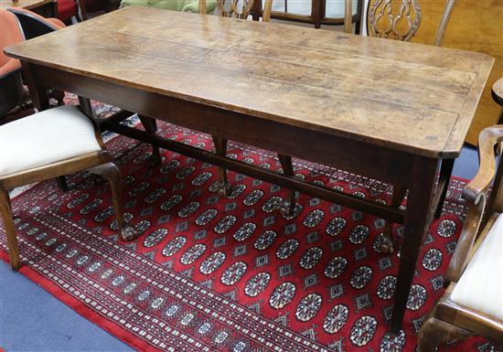 A 19th century French oak farmhouse kitchen table w.185cm